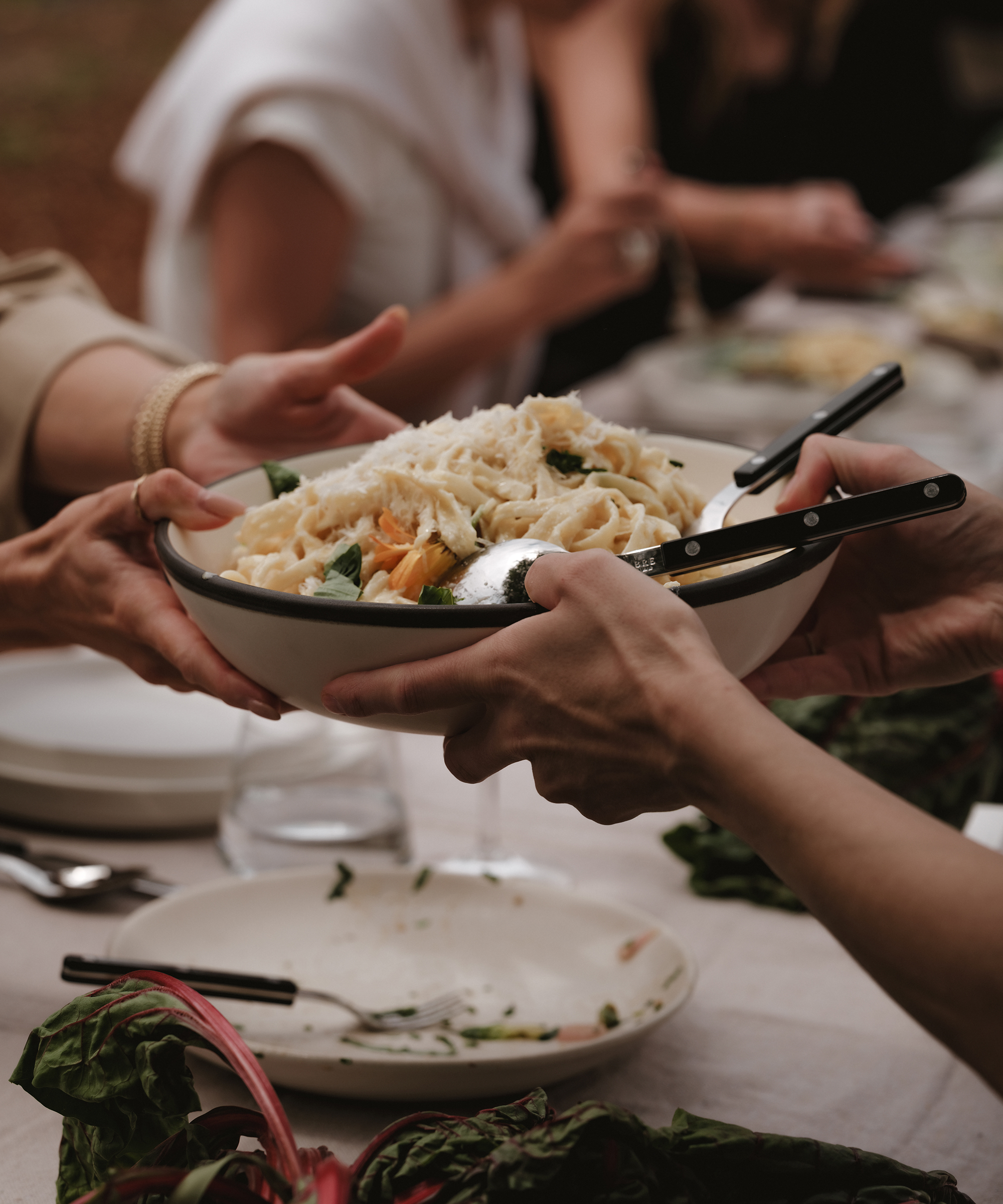 spring-brand-event-pasta-bowl-hands