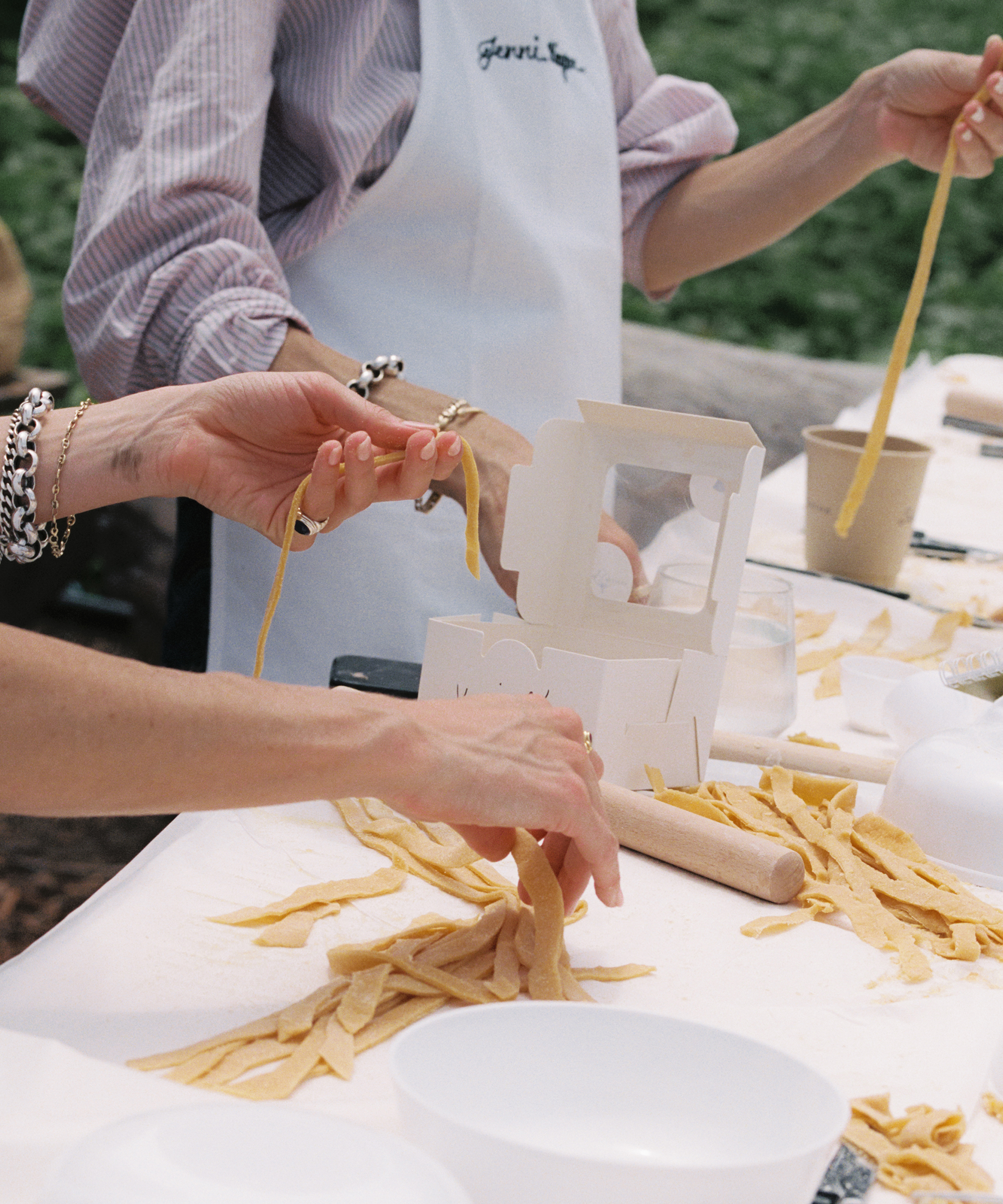 spring-brand-event-pasta-making-hands-cutting-pasta