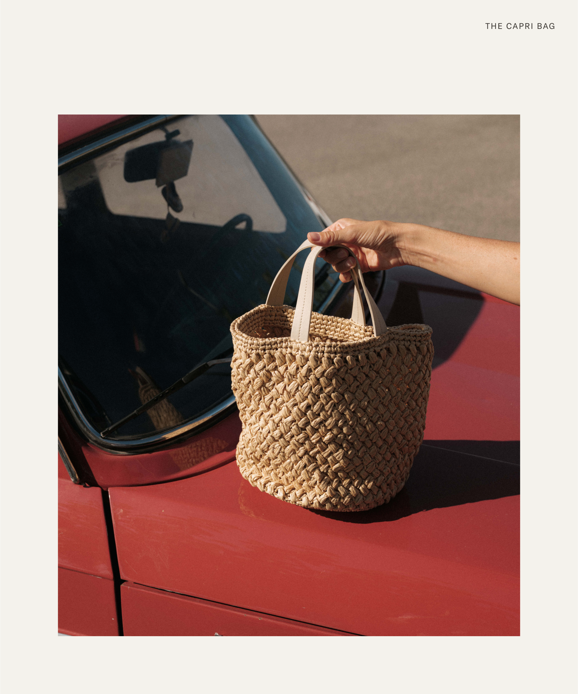 a rattan bag on a red car